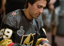 Alex Tuch signs autographs at the Alex Tuch 3 on 3 Pro Hockey Game to benefit Maureen's Hope Foundation.