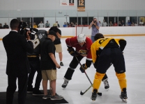 Connor Radley drops the puck at the start of the Alex Tuch 3 on 3 Pro Hockey Game to benefit Maureen’s Hope Foundation.